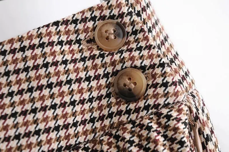 HOUNDSTOOTH PLEATED MINI SKIRT